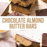 A stack of chocolate almond butter bars, and the top one has a bite out of it.