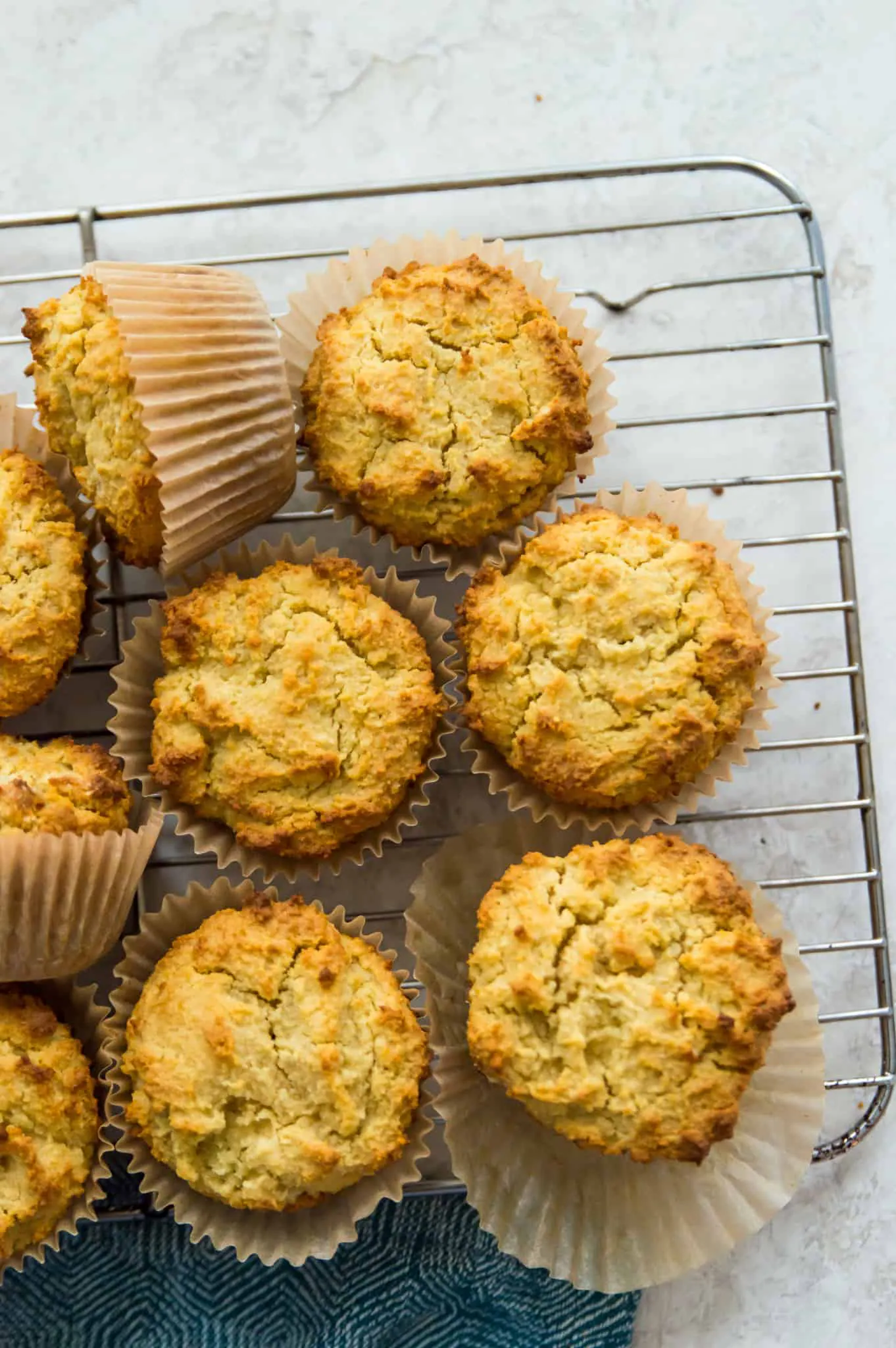 An overhead view of paleo cornbread muffins on a wire rack