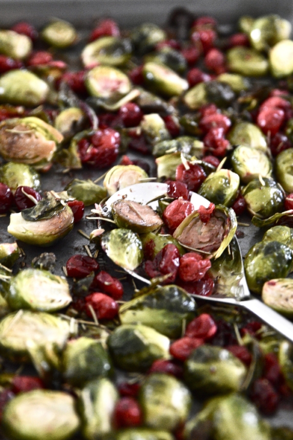 A spoonful of roasted Brussels sprouts with cranberries 
