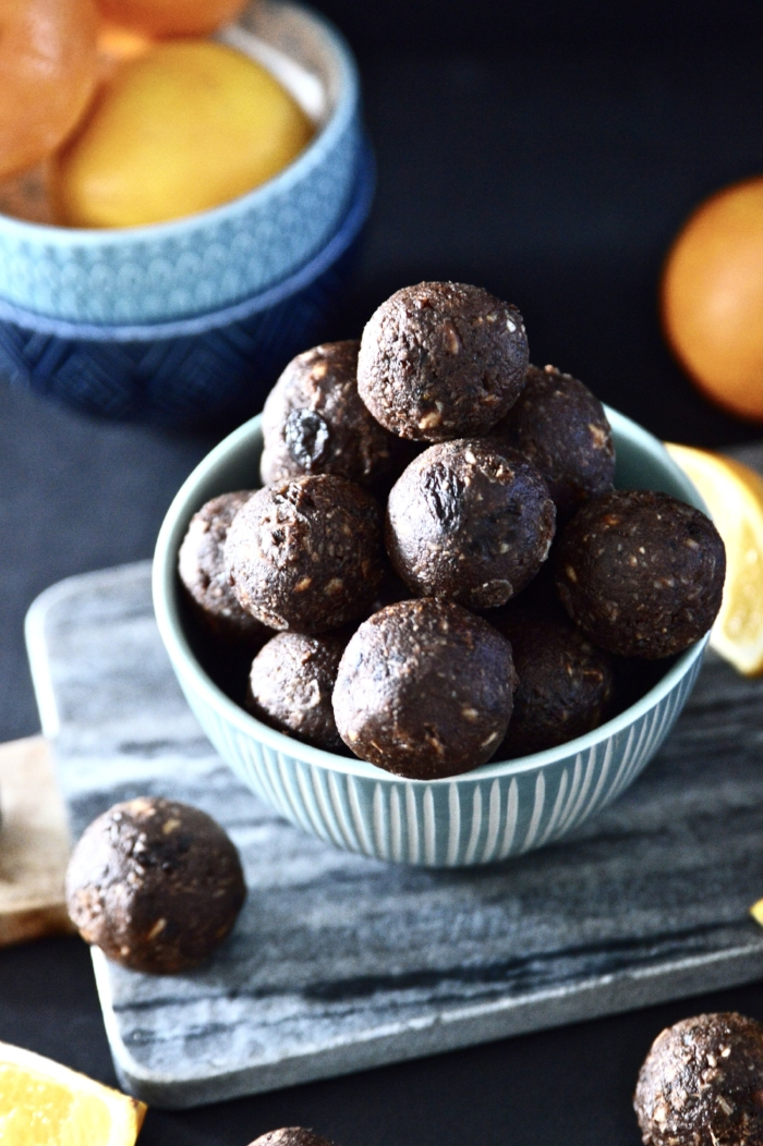  Paleo Orange Chocolate Energy Balls. Because orange and chocolate just belong together. If you are looking for a quick and healthy snack these Paleo Orange Chocolate Energy Balls are the perfect option. These Paleo Orange Chocolate Energy balls not only taste amazing but they are also really, really easy to make! #paleo #vegan #chocolate 