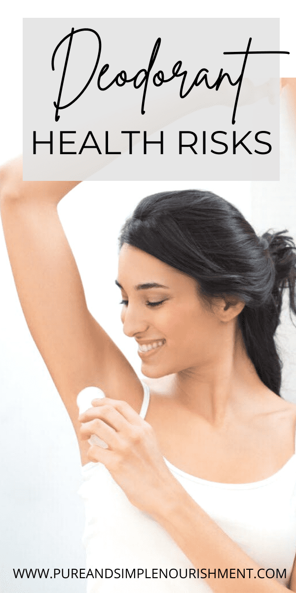 a women putting on deodorant 