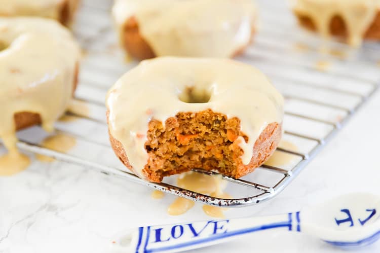 A paleo carrot cake donut with icing