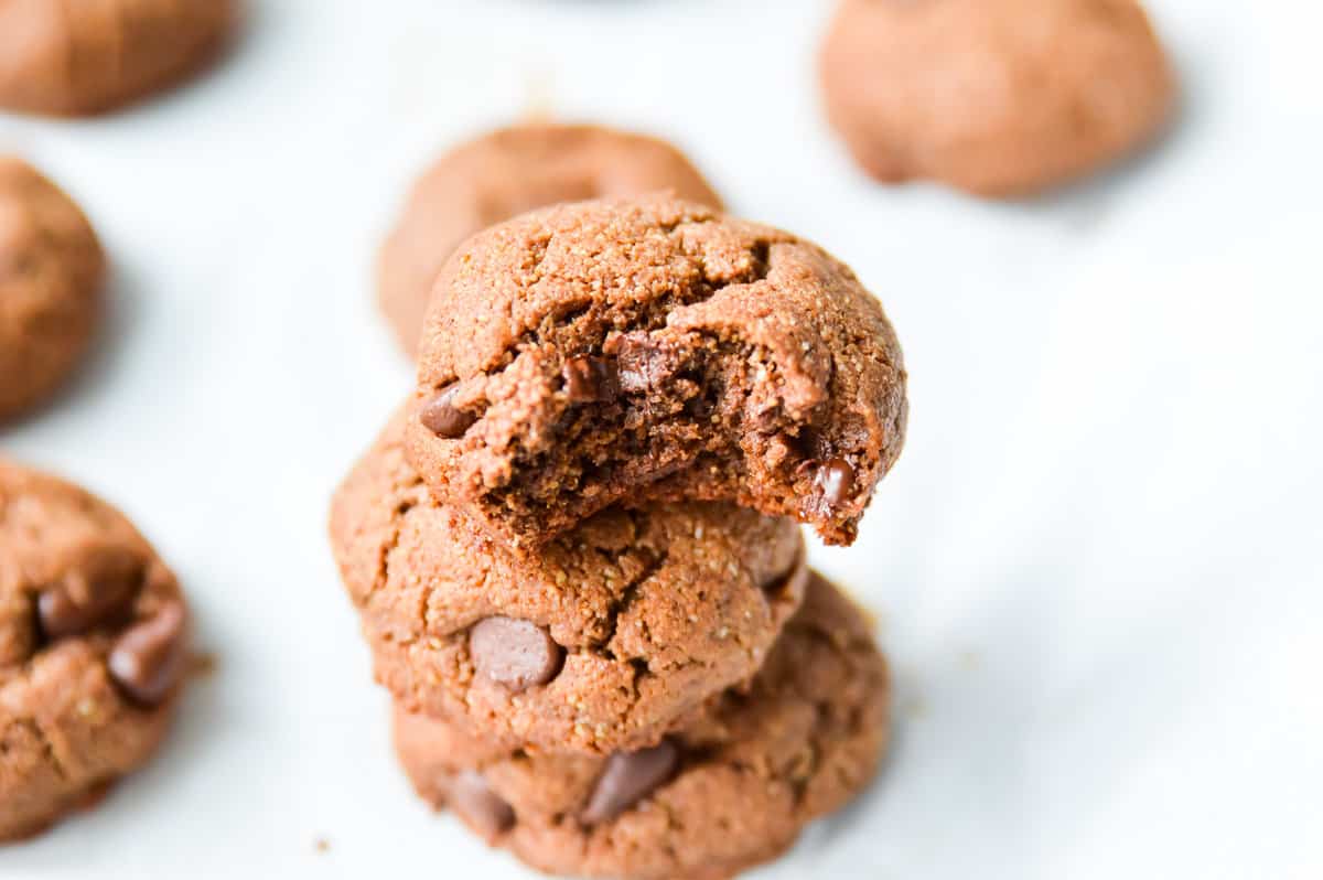 Paleo Double Chocolate Fudge Cookies. Do I even need to say more? These chocolate cookies make the perfect grain free treat. Pair these double chocolate cookies with a glass of dairy free milk and I can't think of anything better! #paleo #cookie #chocolate #glutenfree #dairyfree #fudge #chocolatechip