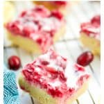 The best gluten free lemon bars with cranberry recipe. These lemon bars are easy, healthy and paleo. They are dairy free and made with coconut instead. #lemonbars #paleo