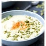 Vegan cauliflower soup. The perfect creamy, dairy free, healthy and easy comfort food. Filled with veggies this soup is paleo and Whole30 compliant. #soup #vegan