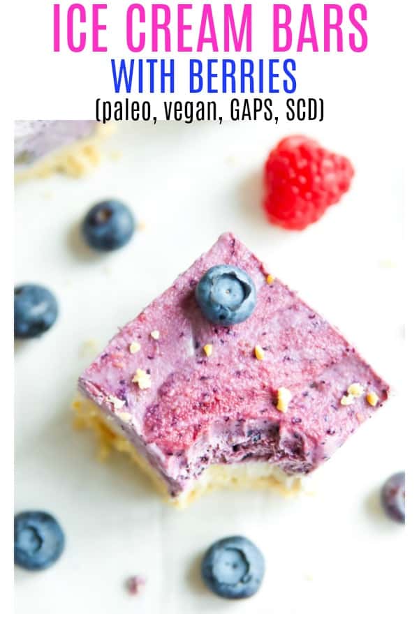 Paleo ice cream bars with berries are going to become your favourite no churn vegan ice cream treat. Easy to make with coconut milk, these dairy free ice cream bars have a vanilla layer and a berry layer with a crunchy crust that is like ice cream cake. #icecream #paleo