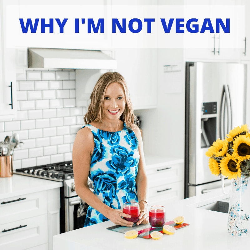 Girl in kitchen with floral dress and red drink with title "Why I'm Not Vegan" 
