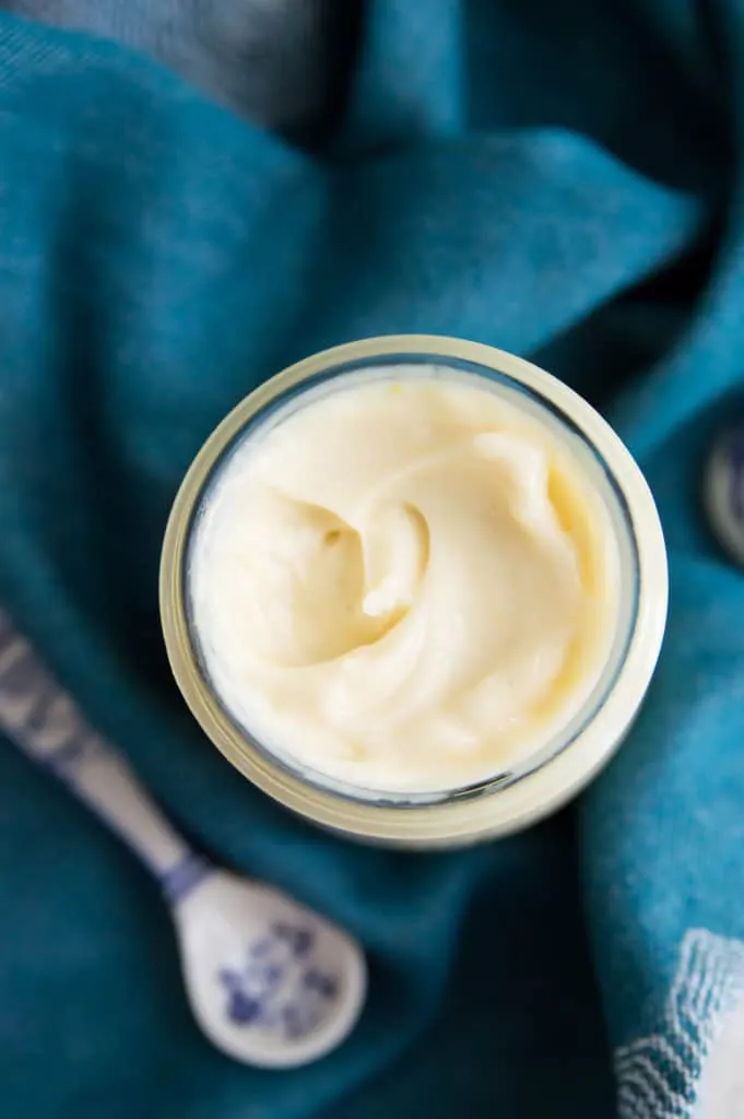 An overhead view of a jar of homemade keto mayonnaise 