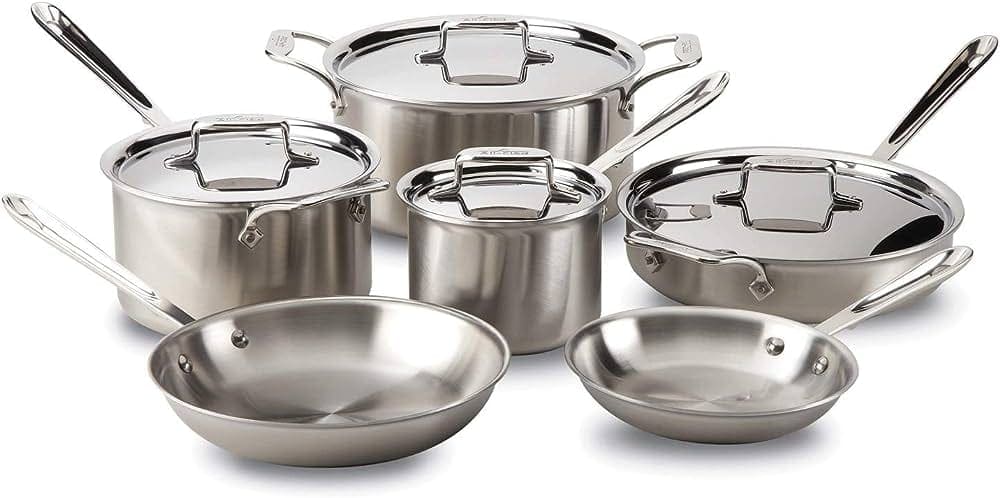 A set of All-Clad stainless steel pots and pans.