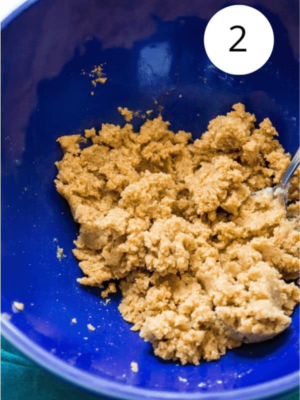 A bowl with uncooked dough in it.
