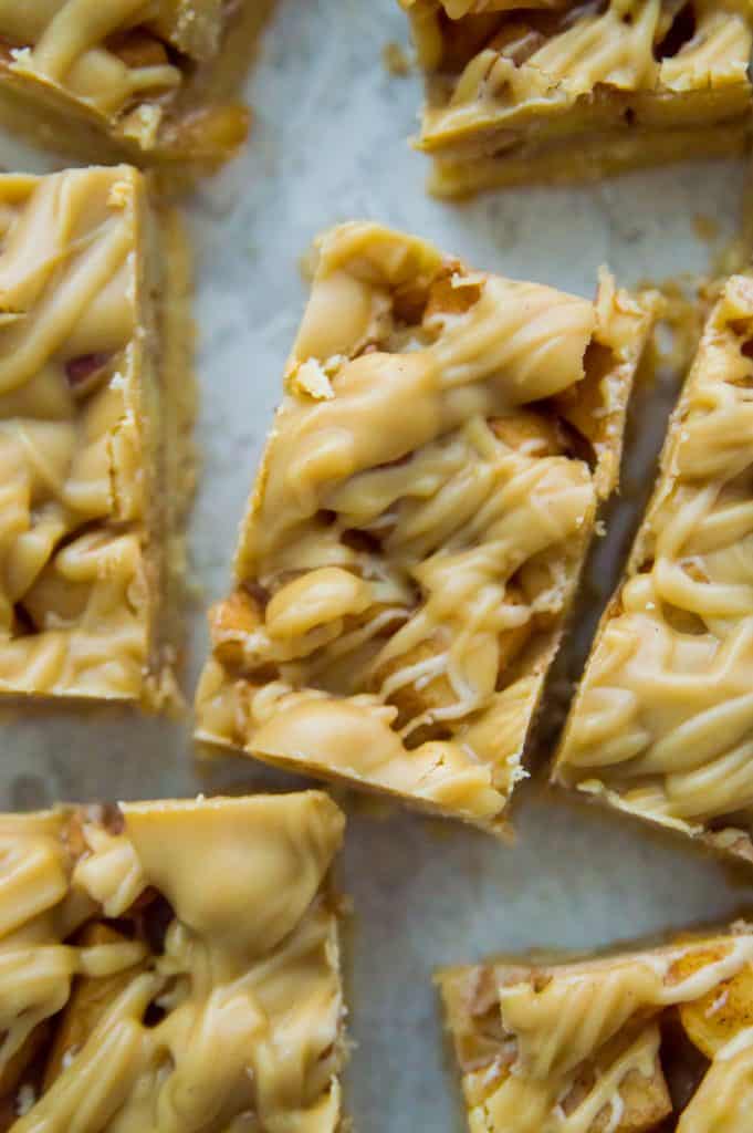 Overhead shot of paleo apple pie bars drizzled in caramel
