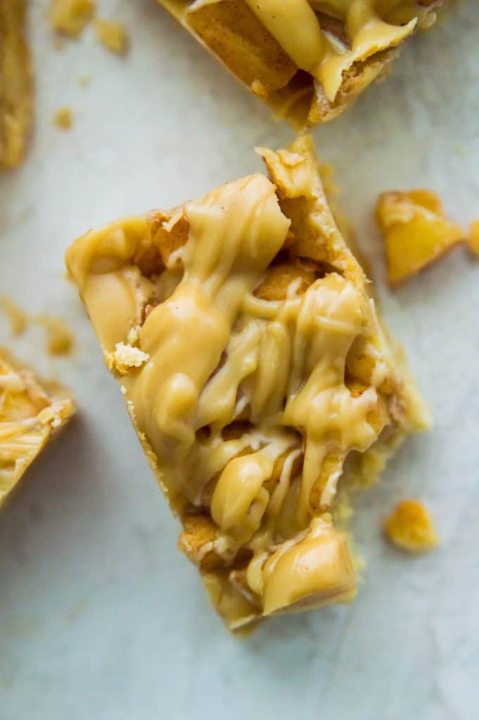 A paleo apple pie bar with a bite out of it