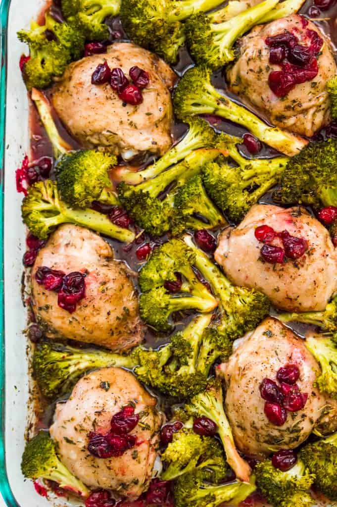 A pan of cranberry maple chicken filled with broccoli 