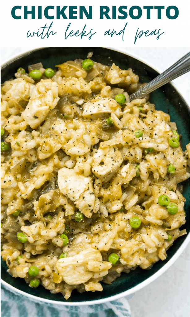 A large bowl of chicken leak risotto with a silver spoon in it