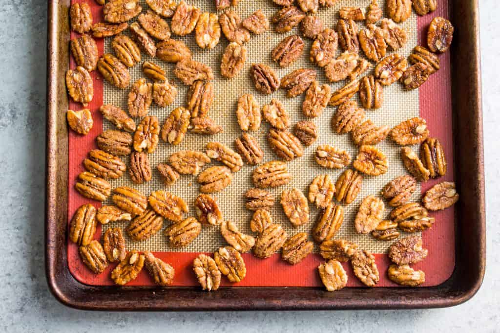 Pecans on a baking sheet.