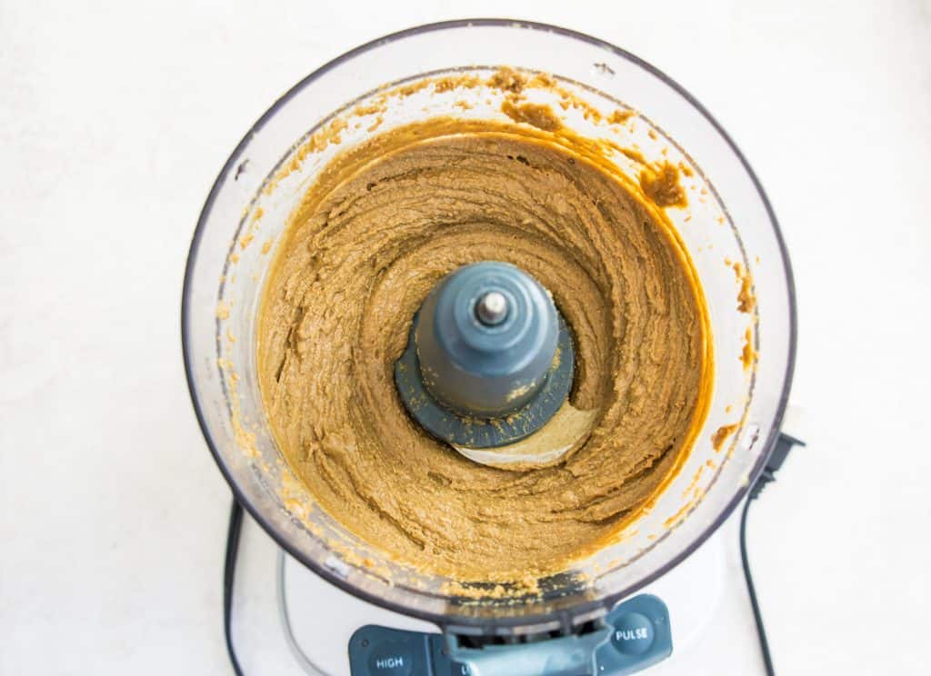 Blended pumpkin seed butter in a food processor.