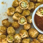 A plate full of breaded okra bites.