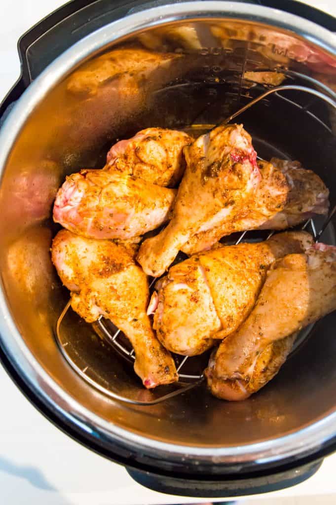 Cooked chicken drumsticks in an Instant pot.