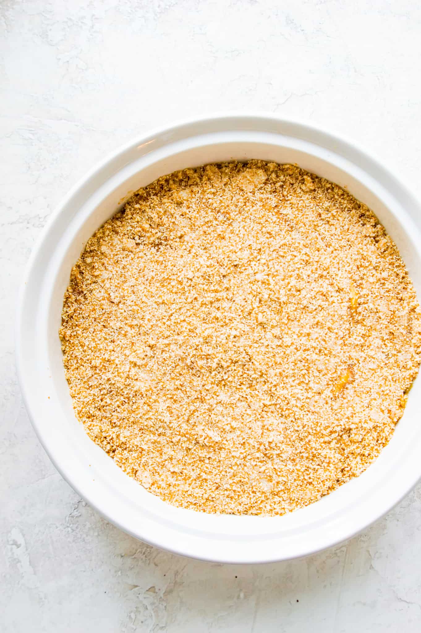 A casserole dish filled with an almond flour mixture.