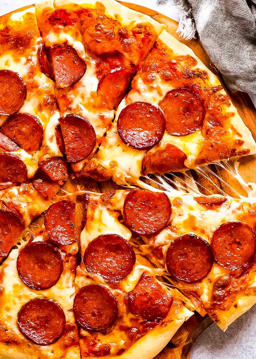 A sliced pepperoni pizza