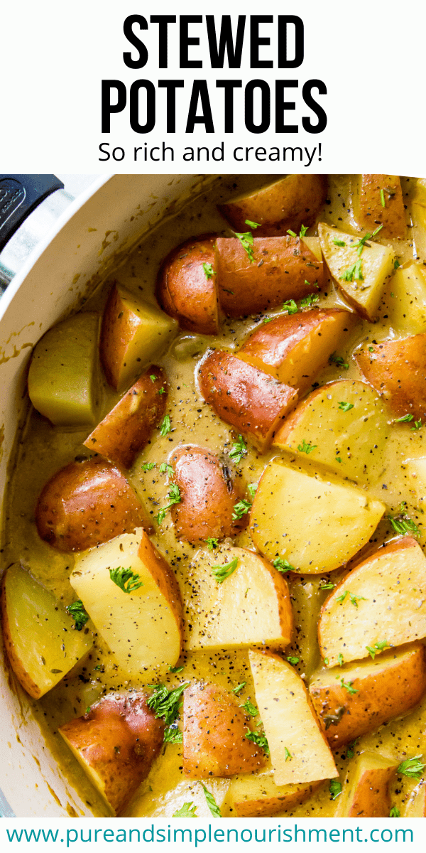 A pan of stewed potatoes topped with fresh parsley