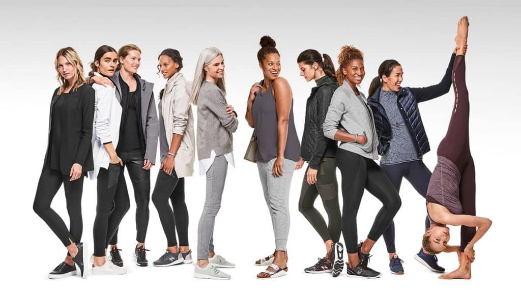 A row of women wearing different styles of Athleta clothing.