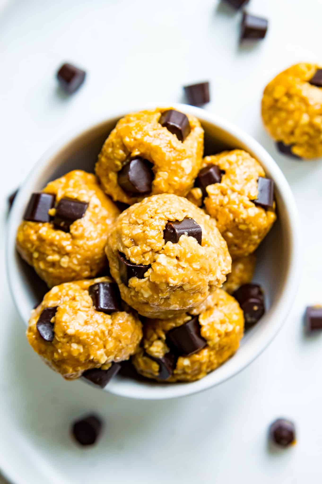 A bowl of peanut butter chocolate chip bliss balls. 