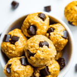 A bowl of peanut butter chocolate chip bliss balls