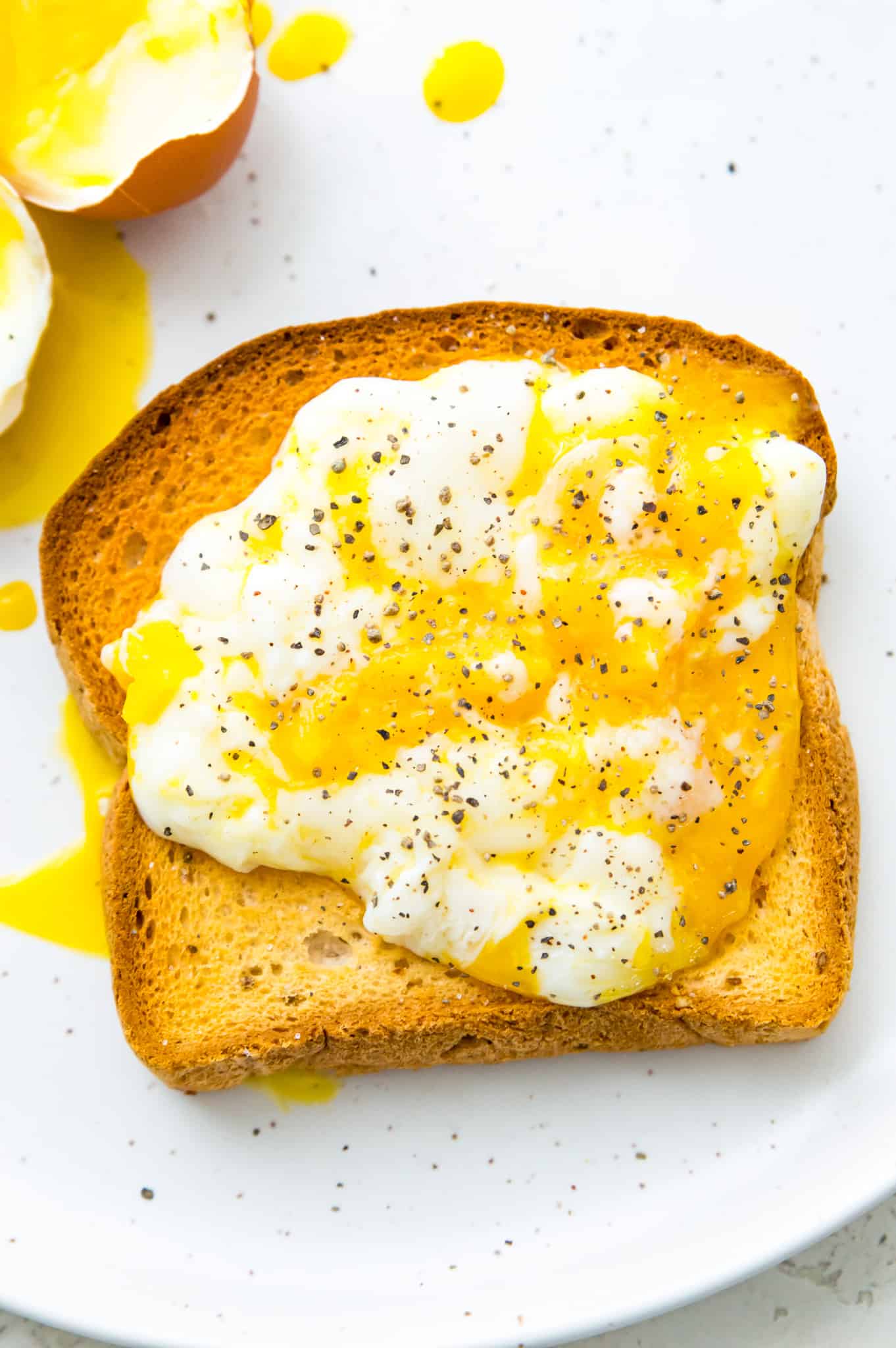 A soft boiled egg on a piece of toast