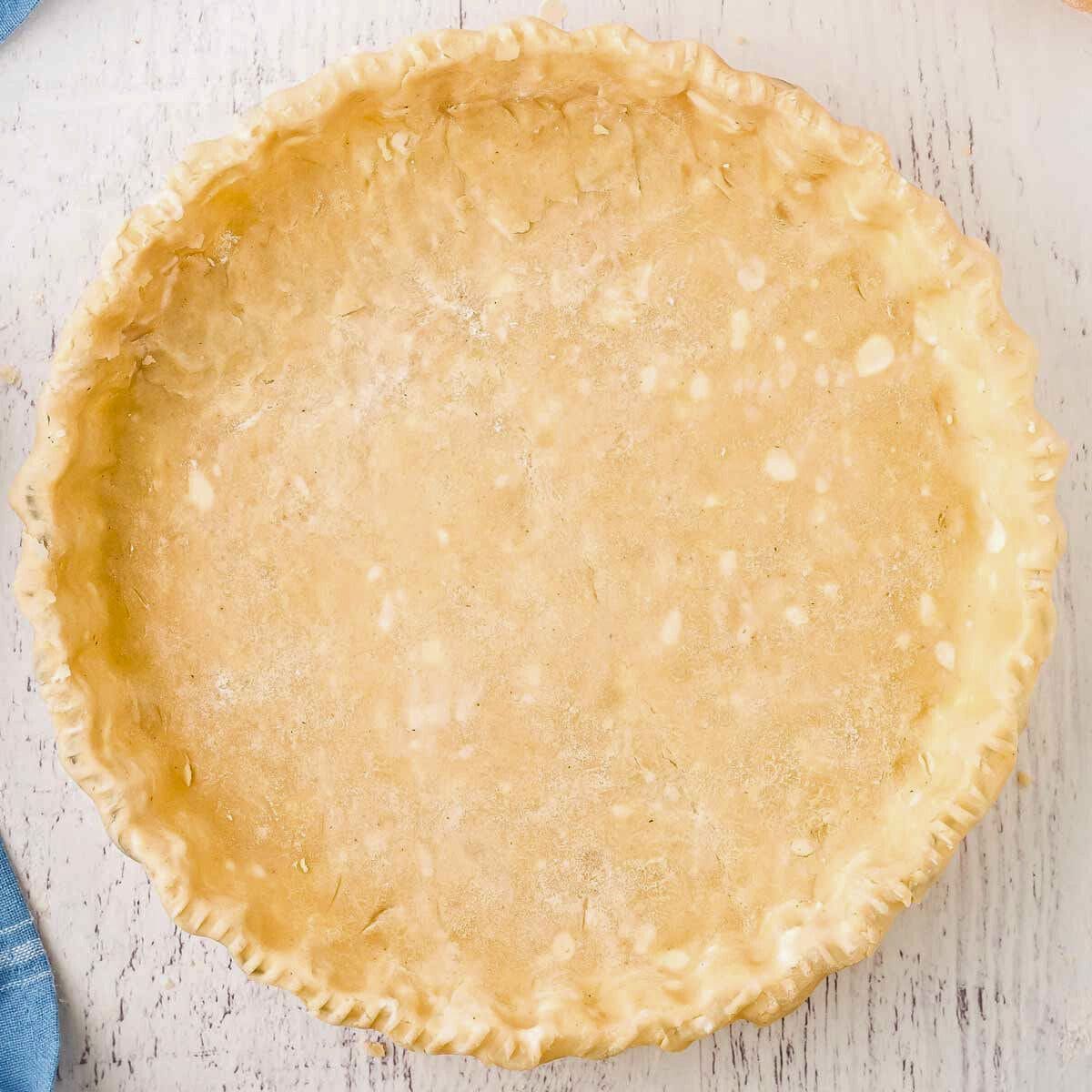 An uncooked pie crust.