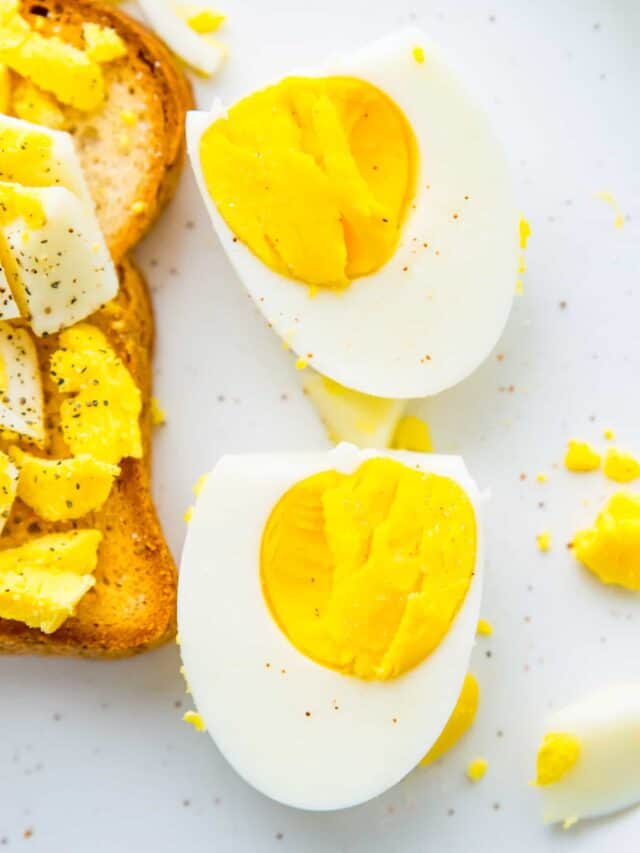 A hard boiled egg that has been cut in half.