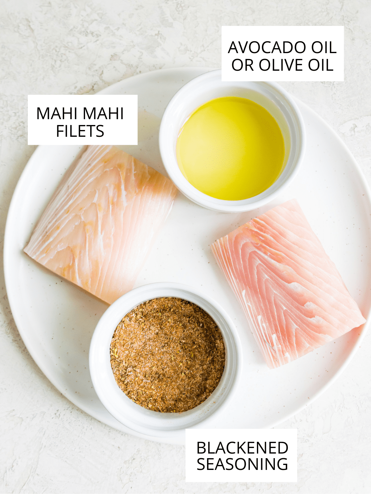 Ingredients needed for making blackened Mahi Mahi separated into small bowls.