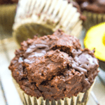 a chocolate avocado muffin on a rack