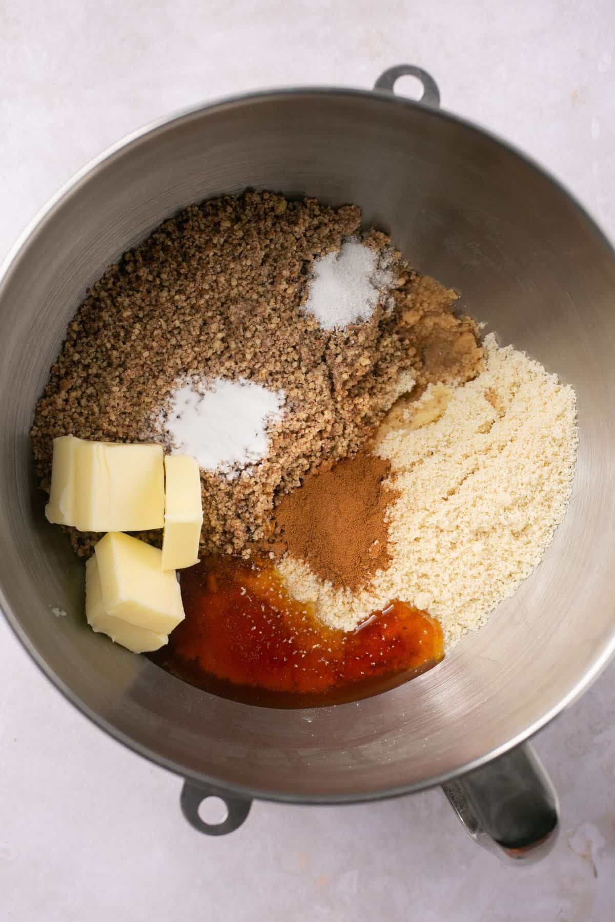 The ingredients needed for making an apple bar crust in a large bowl.