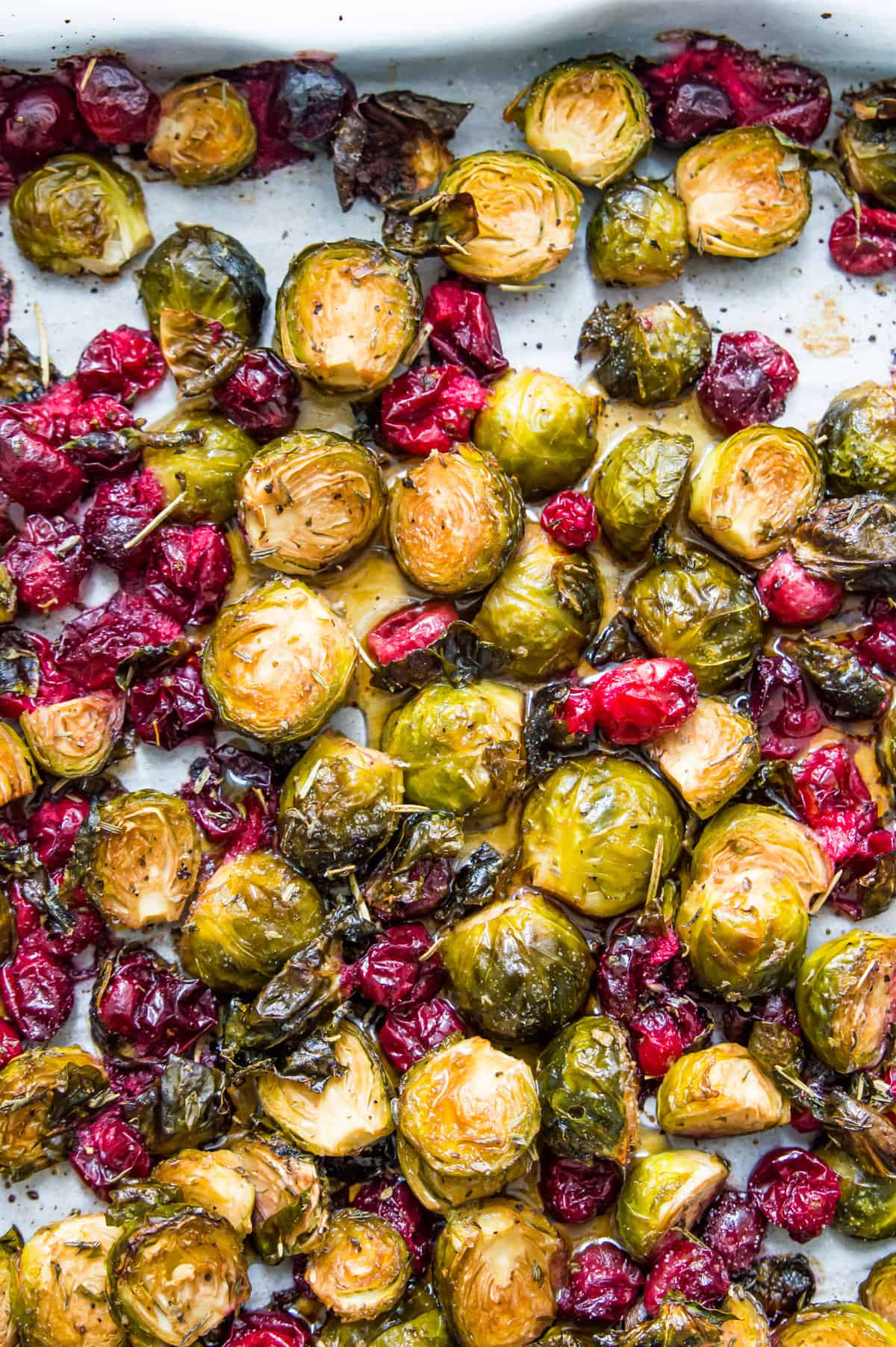 Roasted Brussels sprouts and cranberries coated in maple syrup.