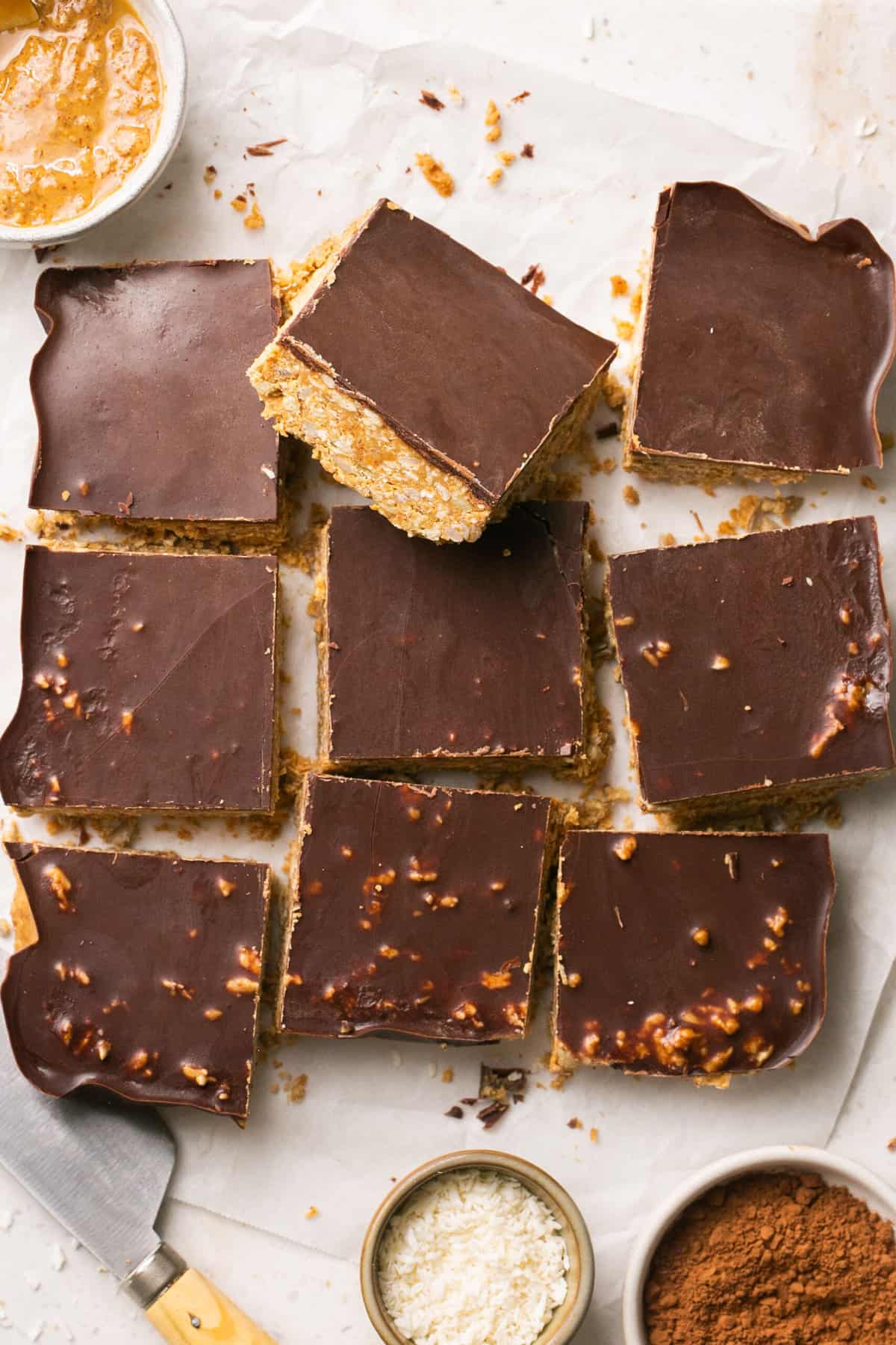 Homemade chocolate almond butter bars cut into pieces. 