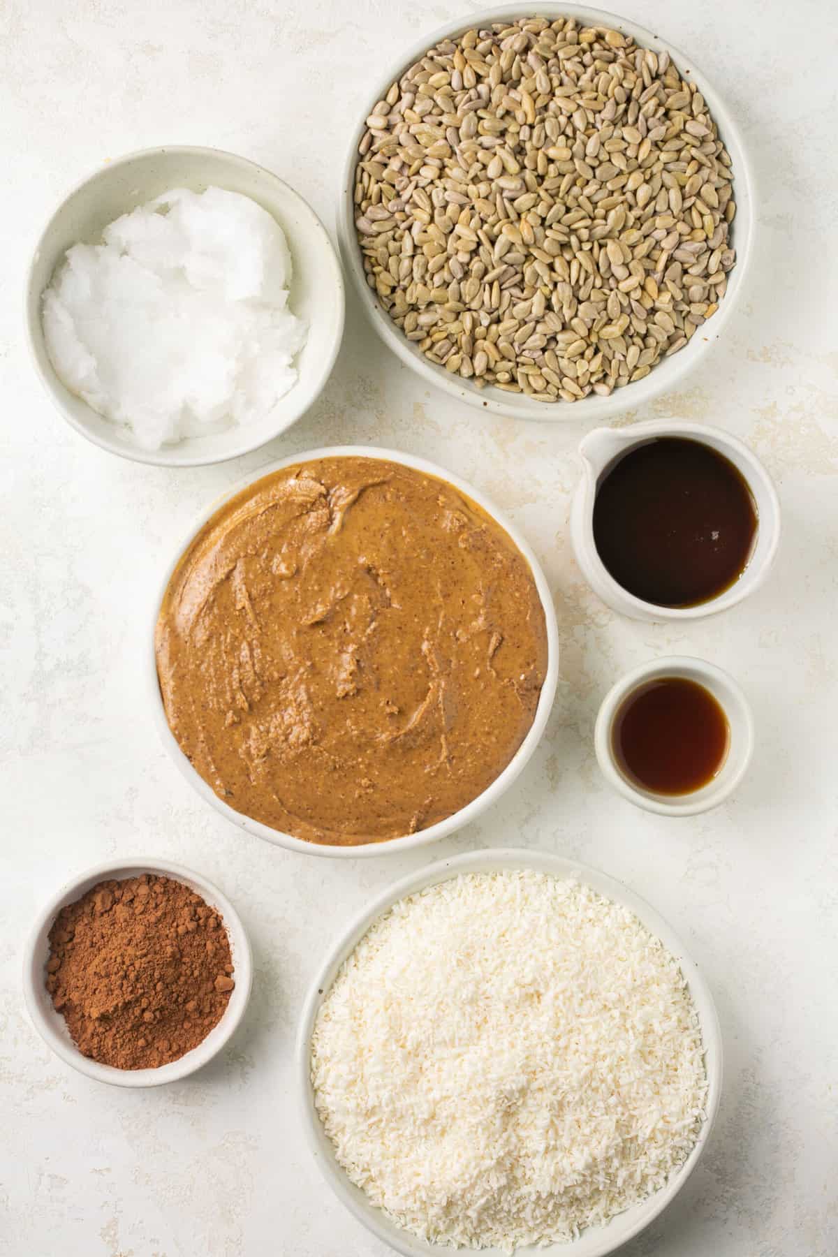 The ingredients needed to make homemade almond butter bars with chocolate.
