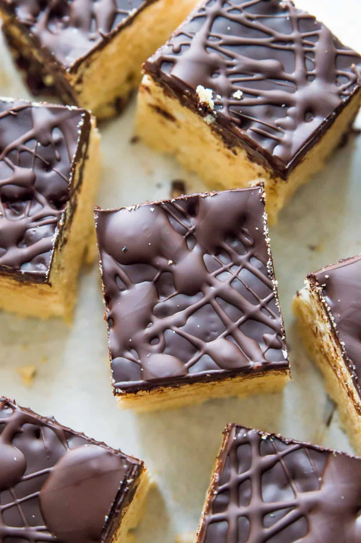 Pieces of chocolate covered Rice Krispie Treats. 