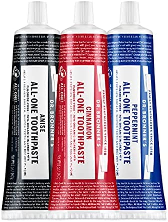 Three tubes of Dr. Bronner's toothpaste. 