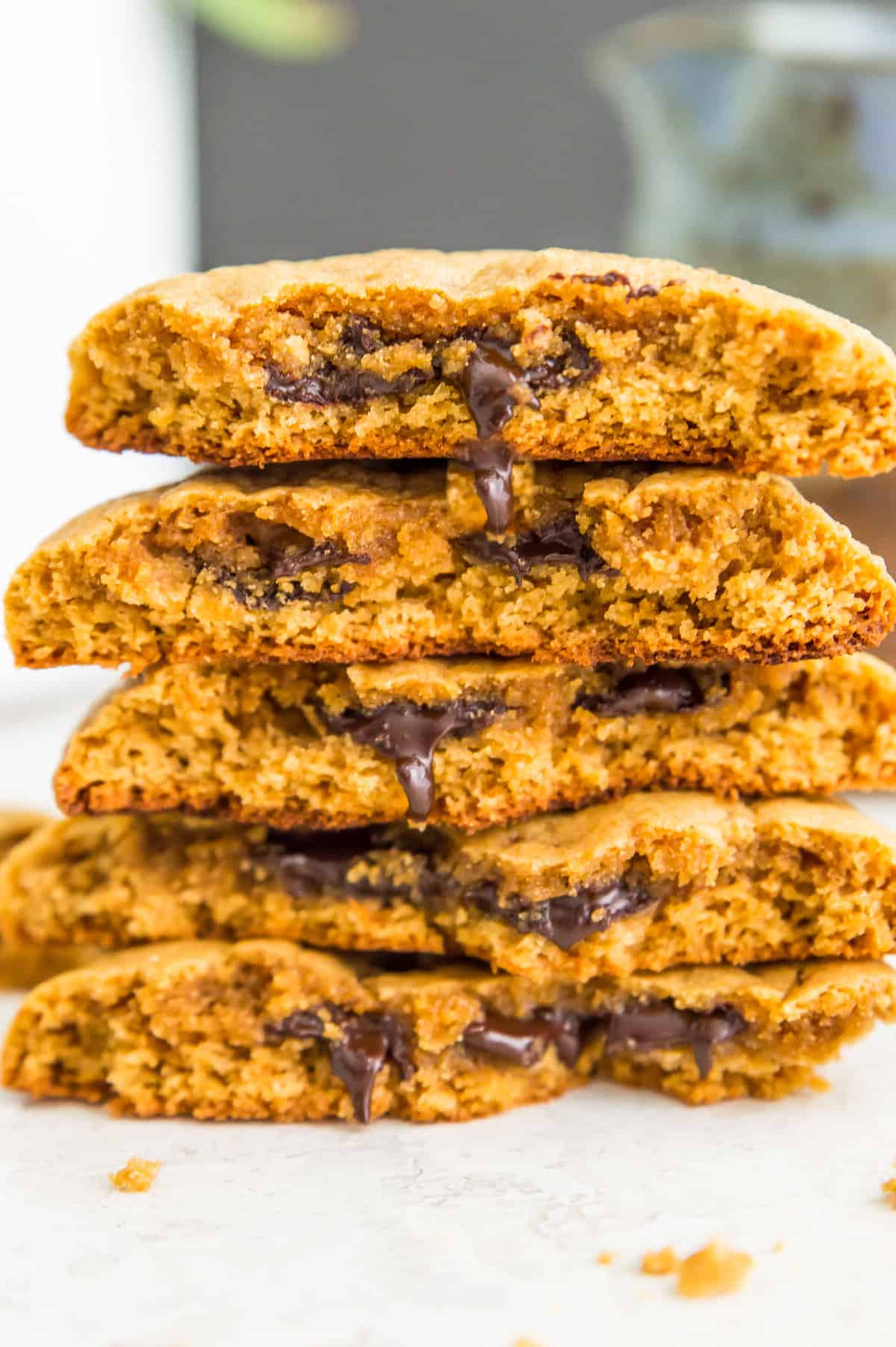 A stack of five chocolate filled cookies.