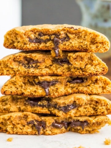 A stack of chocolate filled cookies.
