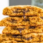 A stack of five chocolate filled cookies.