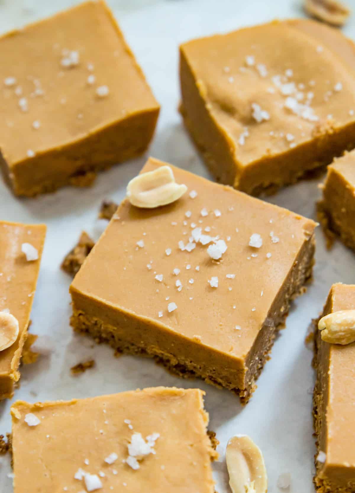 Pieces of no bake peanut butter fudge topped with coarse sea salt. 