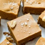 Pieces of no bake peanut butter fudge topped with coarse sea salt.