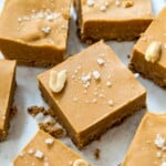 Cut up pieces of no bake peanut butter fudge topped with coarse sea salt.