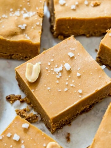 Cut up pieces of no bake peanut butter fudge topped with coarse sea salt.