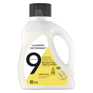 A bottle of 9 Elements Natural laundry detergent. 