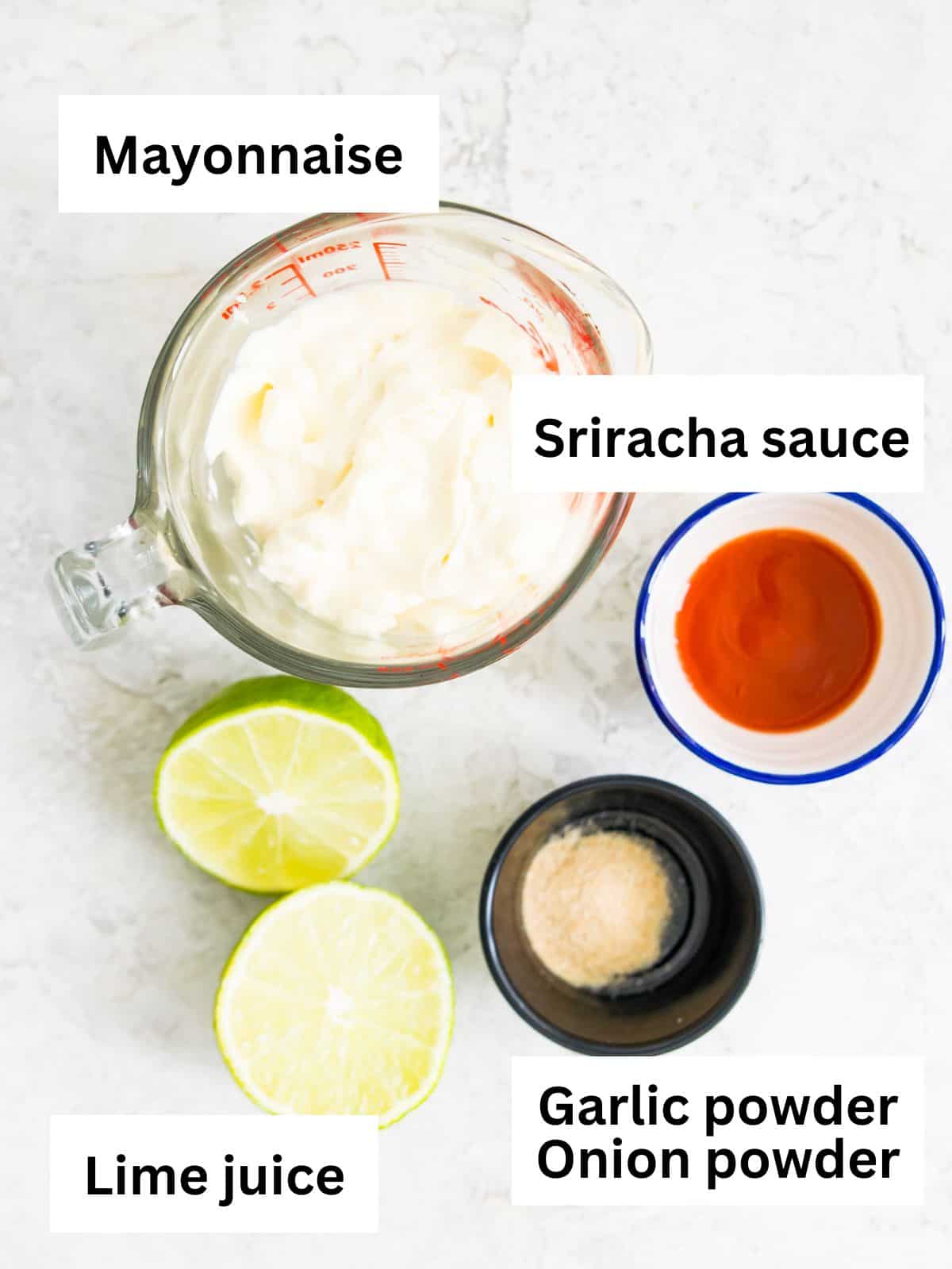The ingredients needed to make sriracha aioli separated into bowls.