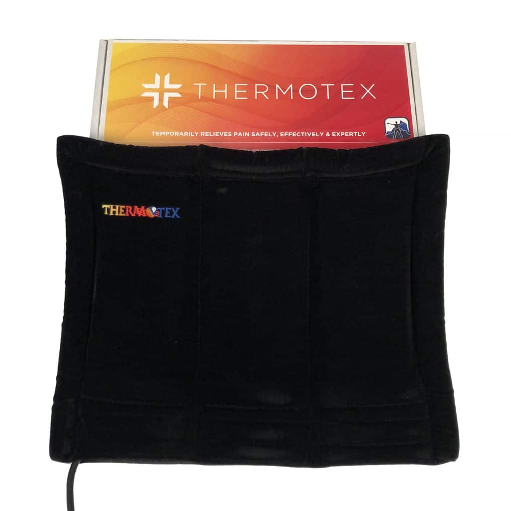 A Thermotex infrared heating pad and the box it came in.