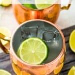 A virgin Moscow mule in a copper mug with a lime slice on top.